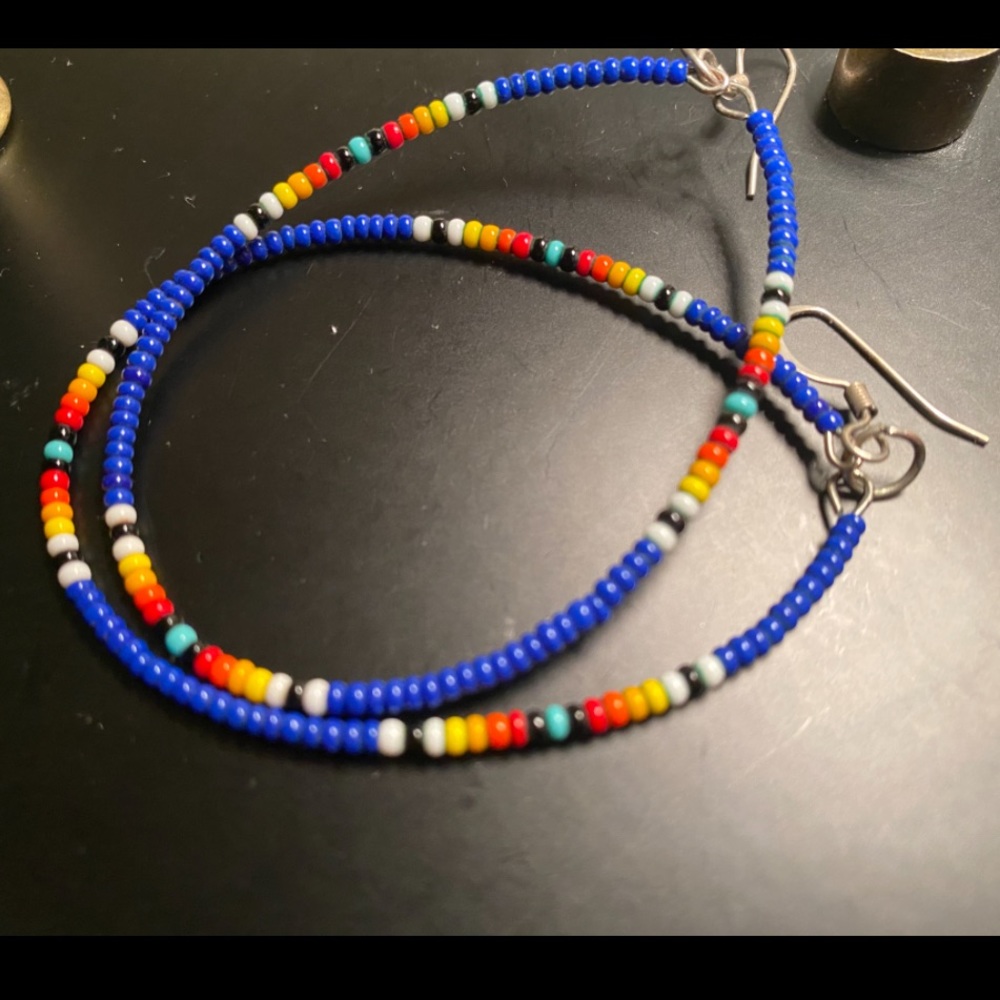 Beautiful multicolored seed bead hoop earrings.